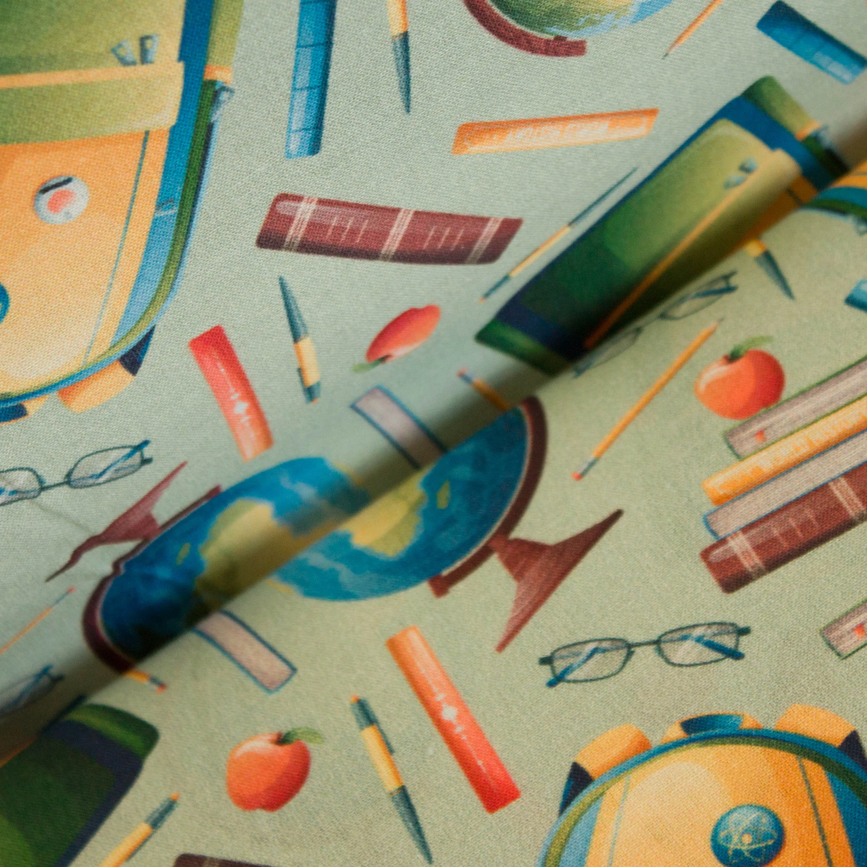 Katoen munt met schoolmateriaal